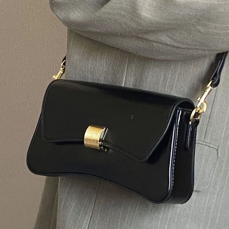 מצלמה נסתרת בתיק לאישה רצועת עור